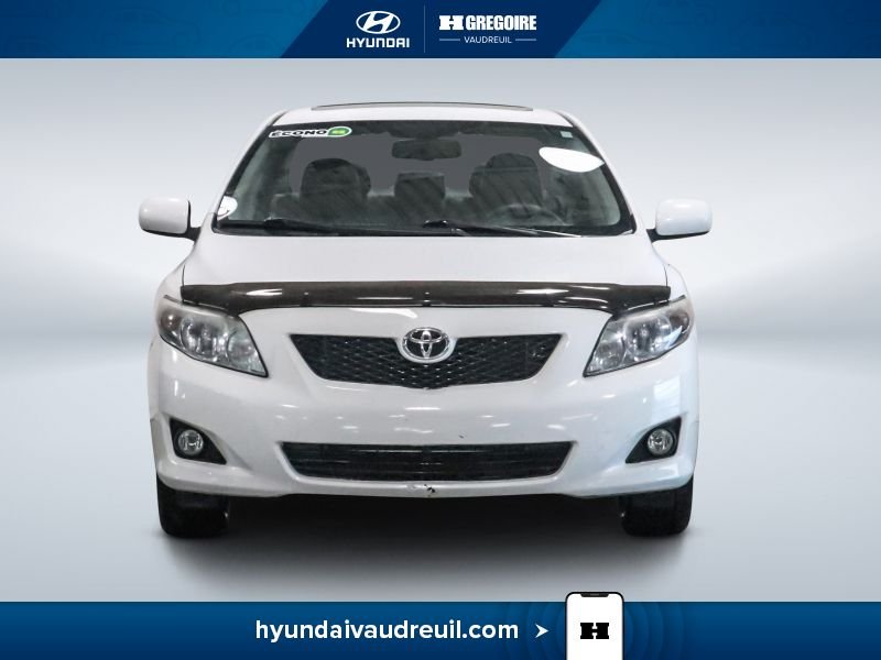 2009 Toyota Corolla White Saint-Eustache - photo #2