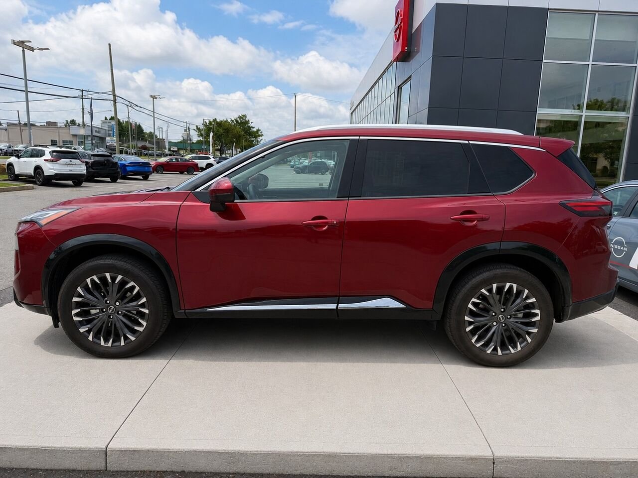 2026 NISSAN Rogue ROGUE PLATINE Scarlet Ember Tintcoat Châteauguay - photo #1
