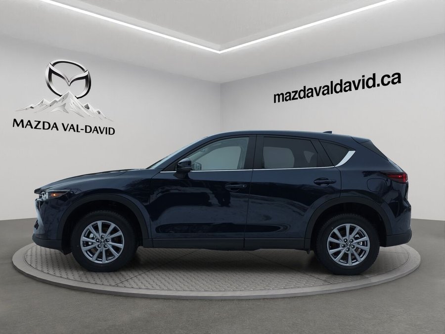 2025 Mazda CX-5 Gs, awd, sièges, volant et rétroviseurs chauffants, hayon électrique Deep Crystal Blue Mica