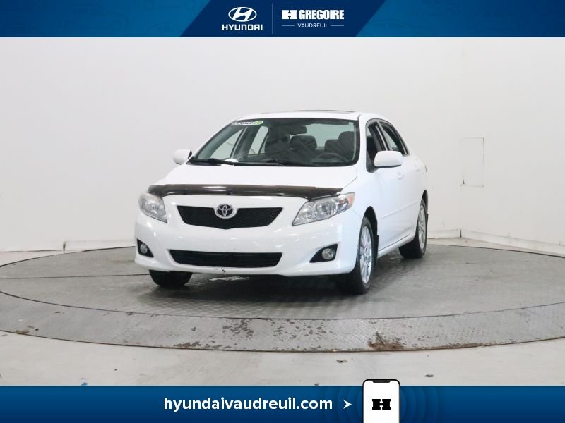 2009 Toyota Corolla White Laval - photo #4