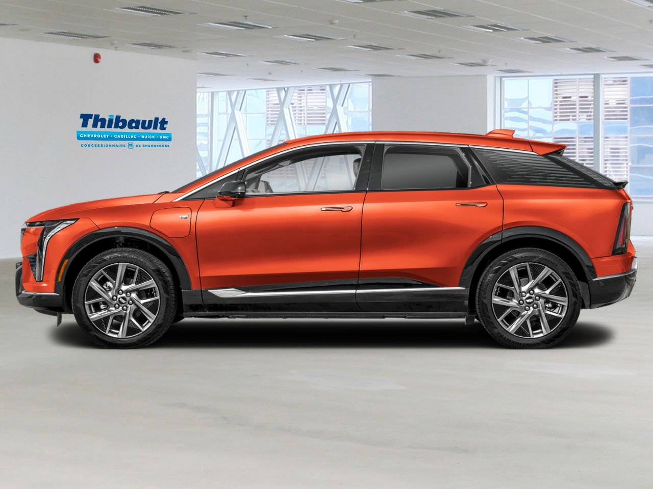 CADILLAC OPTIQ 4 portes - Sport 2027 Orange Sherbrooke - photo #1