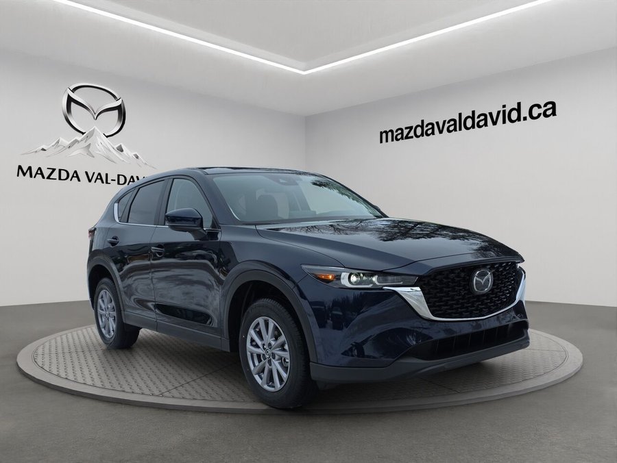 2025 Mazda CX-5 Gs, awd, sièges, volant et rétroviseurs chauffants, hayon électrique Deep Crystal Blue Mica