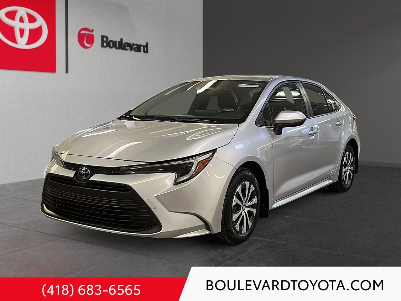 Toyota Corolla 100039A-1 | HYBRIDE LE, AWD 2023 Argent Québec - photo #0