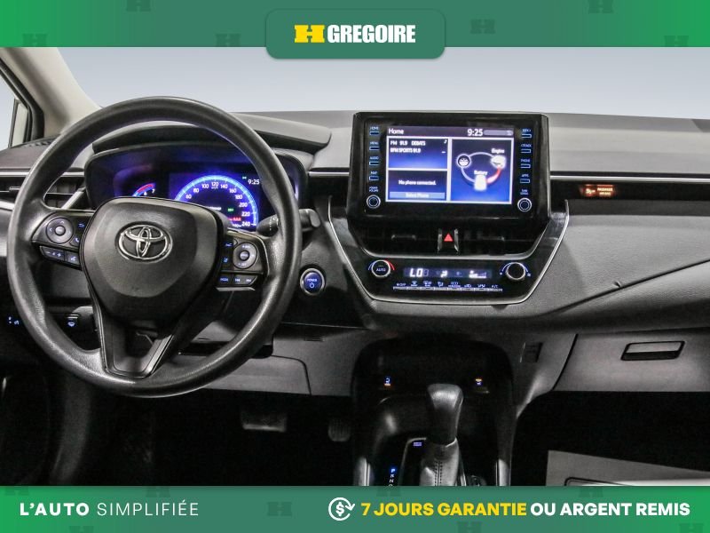 Toyota Corolla R3609 | HYBRID W/LI BATTERY CAMERA SIEGES CHAUFFANTS 2022 Argent Laval - photo #15