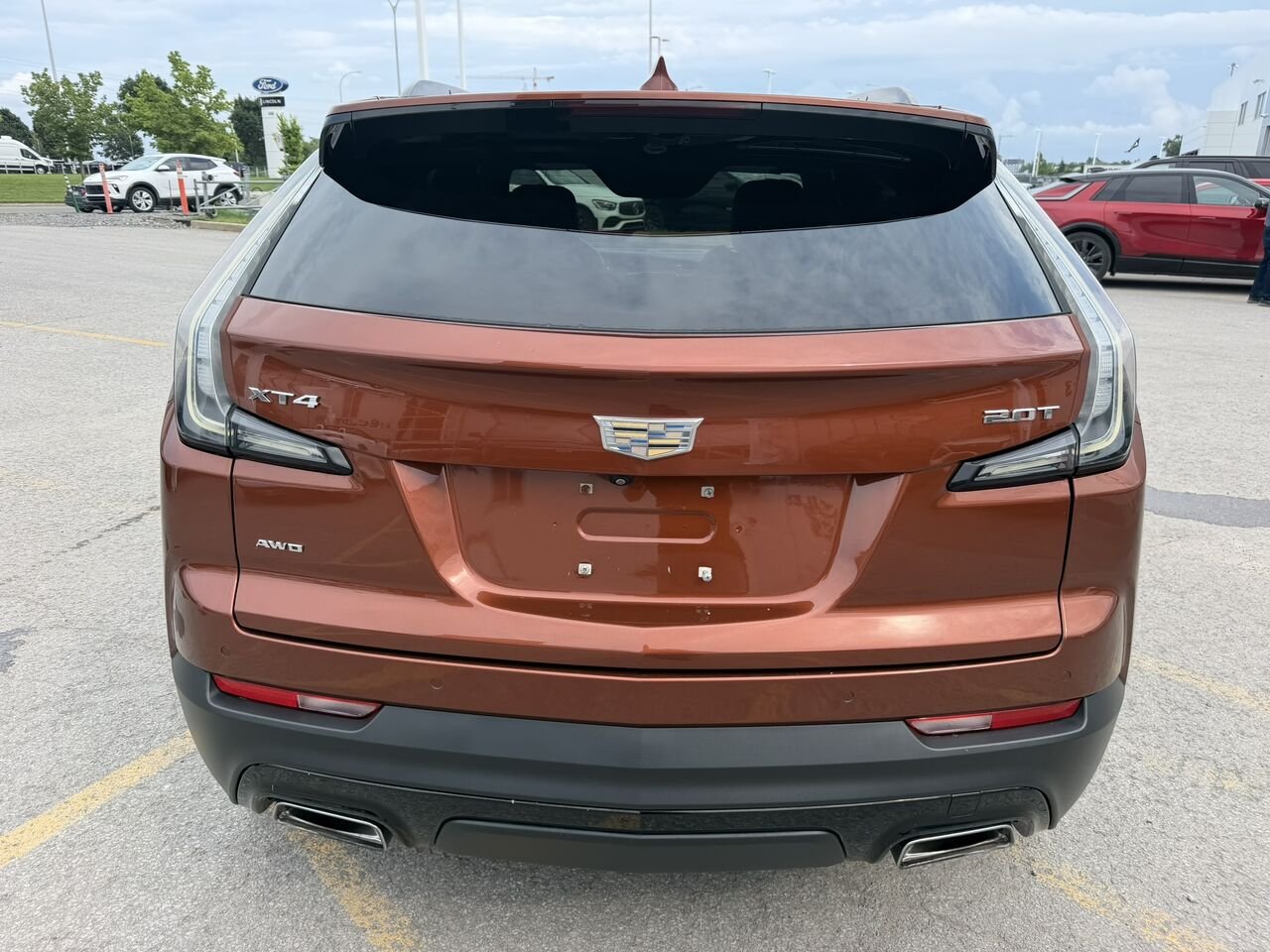 2019 Cadillac XT4 SPORT AWD Orange Laval - photo #7