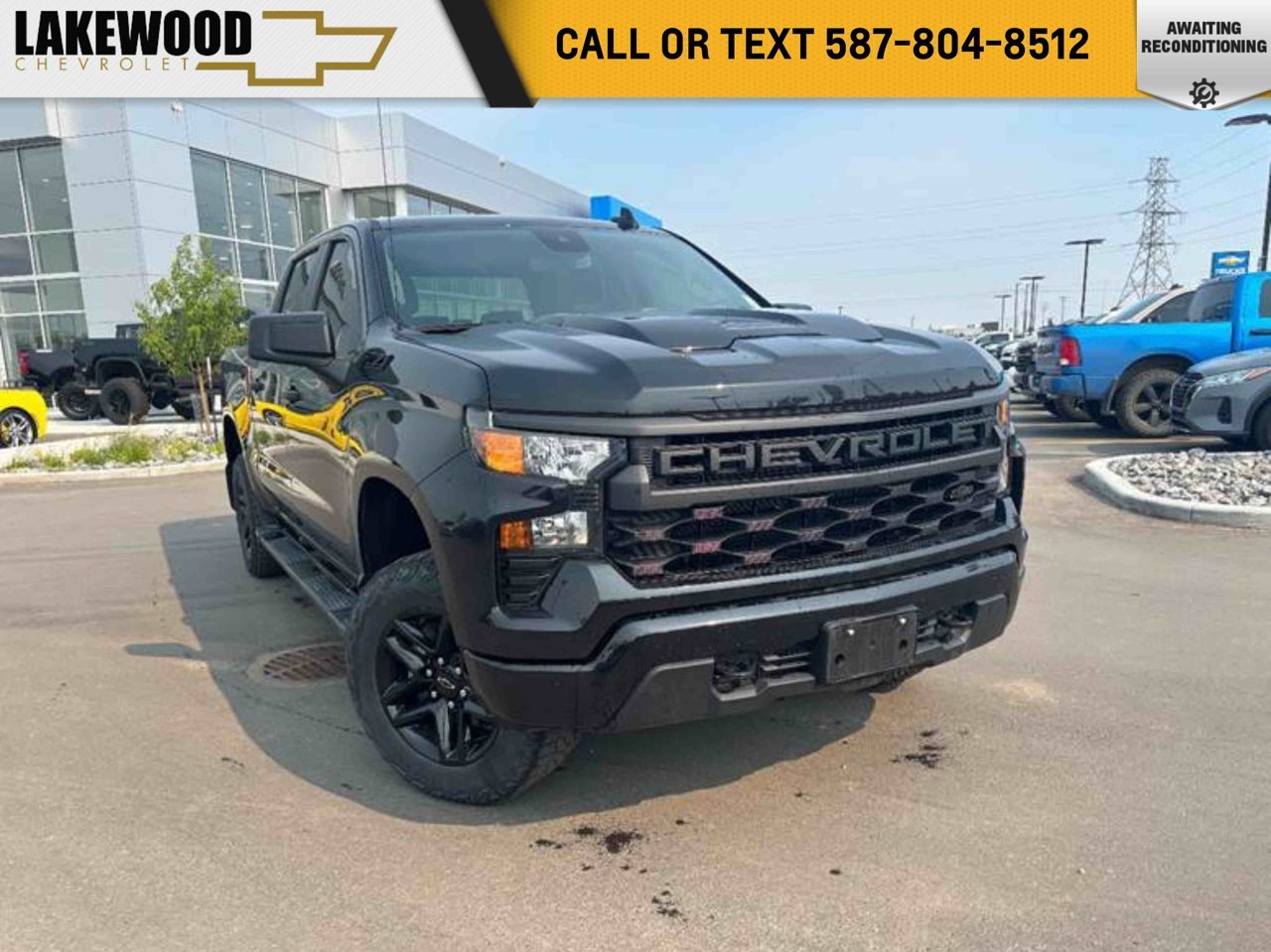 2024 Chevrolet Silverado 1500 4WD Crew Cab 147 Custom Trail Boss Black Sherwood Park - photo #0