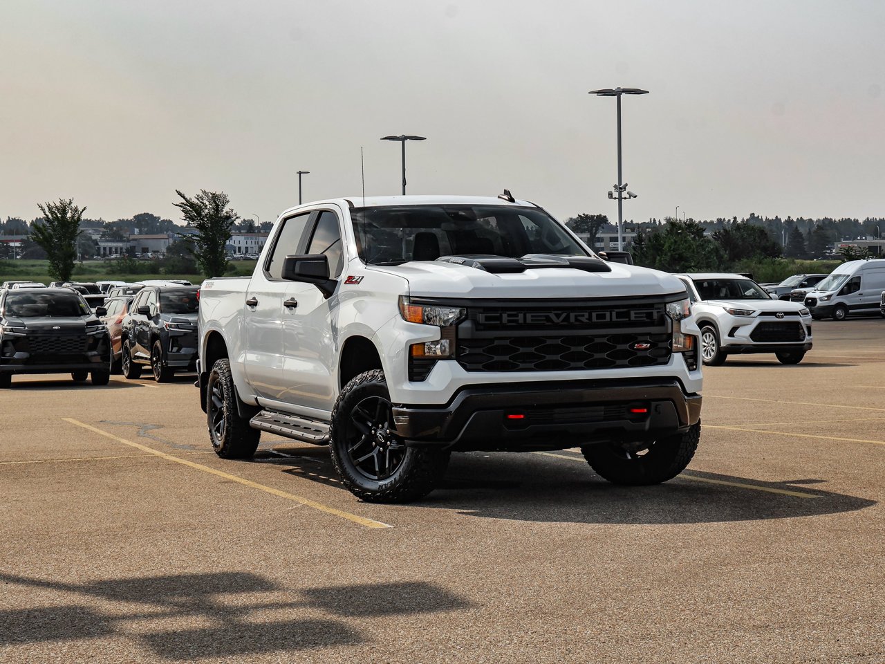 2024 Chevrolet Silverado 1500 4WD Crew Cab 147 Custom Trail Boss White Sherwood Park - photo #1