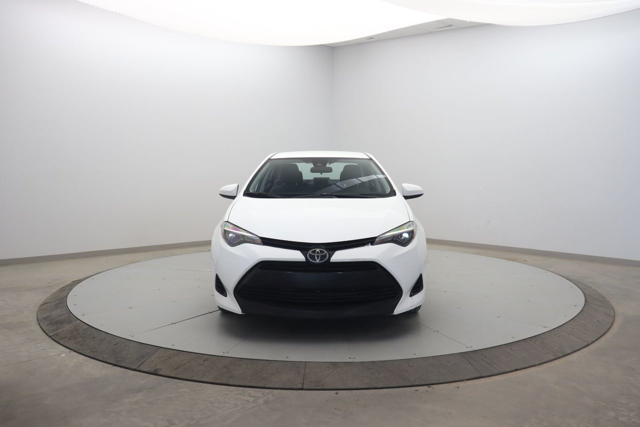 Toyota Corolla NIV 2T1BURHE5JC086477 2018 Blanc Baie-Comeau - photo #1