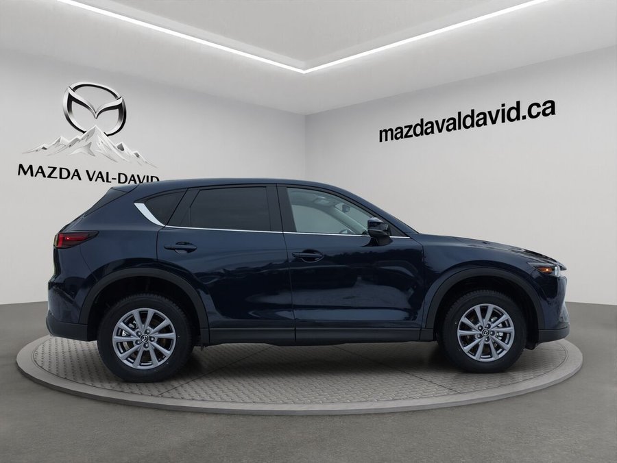 2025 Mazda CX-5 Gs, awd, sièges, volant et rétroviseurs chauffants, hayon électrique Deep Crystal Blue Mica