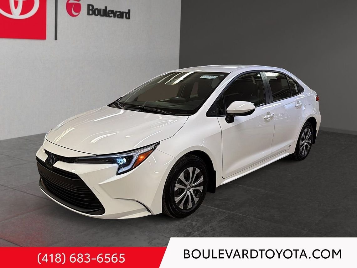 Toyota Corolla 531689-75 | LE HYBRIDE, AWD 2025 Blanc Québec - photo #0