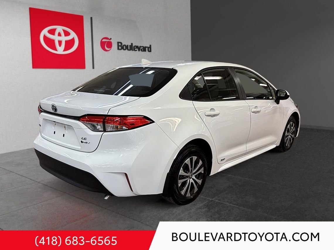 Toyota Corolla 531689-75 | LE HYBRIDE, AWD 2025 Blanc Québec - photo #3
