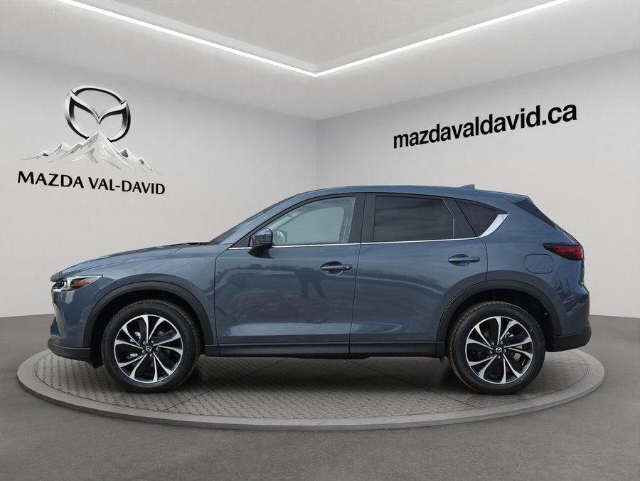 2025 Mazda CX-5 Gs, awd, Toit ouvrant, volant et rétroviseurs chauffants, hayon électrique Rhodium White Metallic