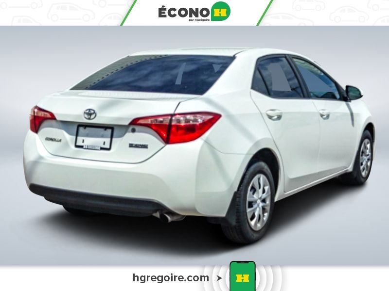 Toyota Corolla 2017 Blanc Laval - photo #7