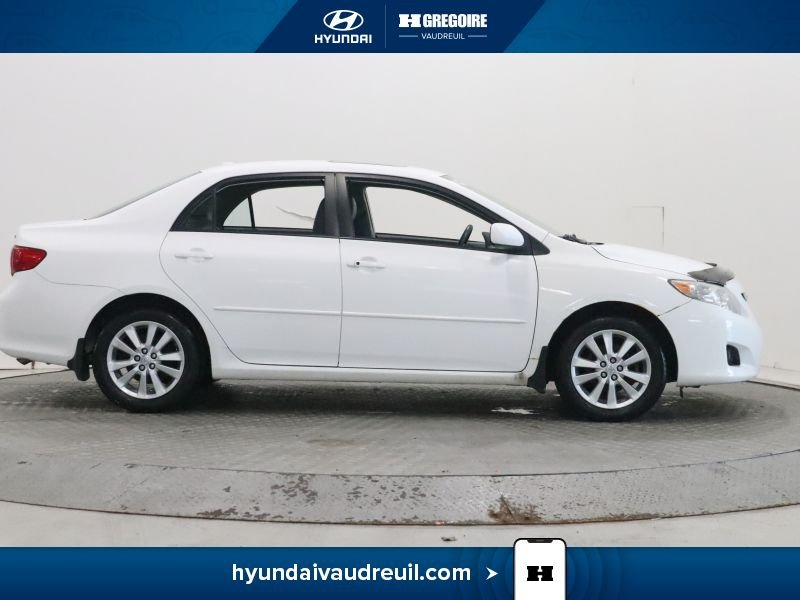 2009 Toyota Corolla White Laval - photo #12