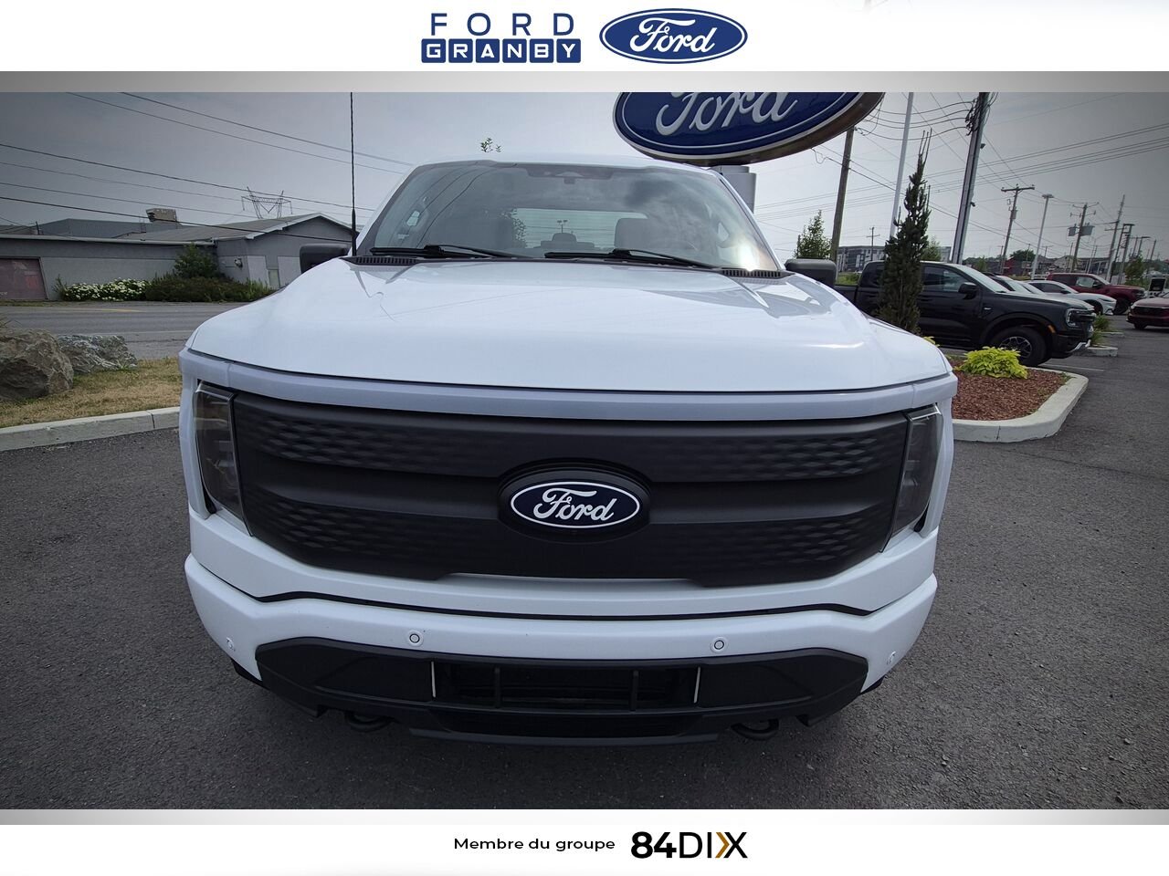 2024 Ford F-150 Lightning White Granby - photo #1