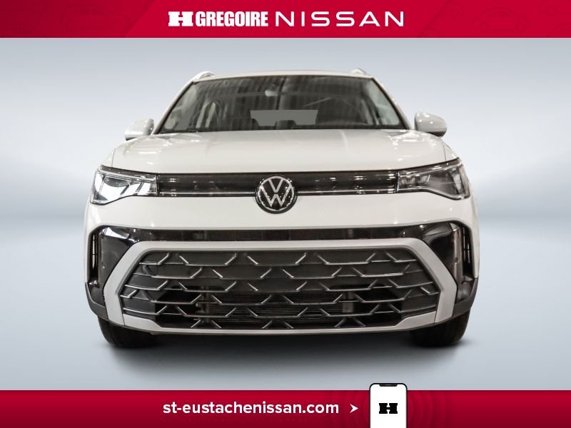 2025 Volkswagen Taos White Laval - photo #2