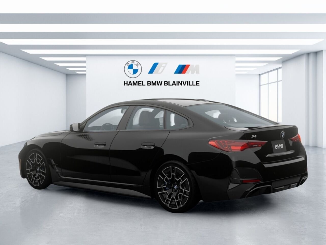2026 BMW i4 xDrive40 Black Sapphire Metallic Blainville - photo #1