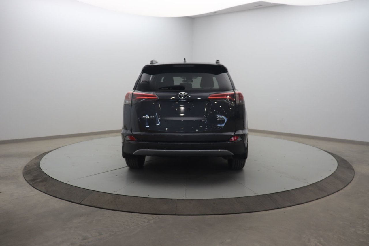 2018 Toyota RAV4 VIN 2T3RFREV9JW852844 Grey Baie-Comeau - photo #4