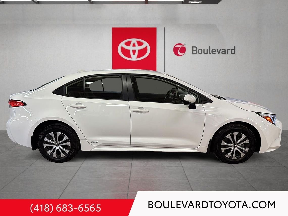 Toyota Corolla 531689-75 | LE HYBRIDE, AWD 2025 Blanc Québec - photo #2