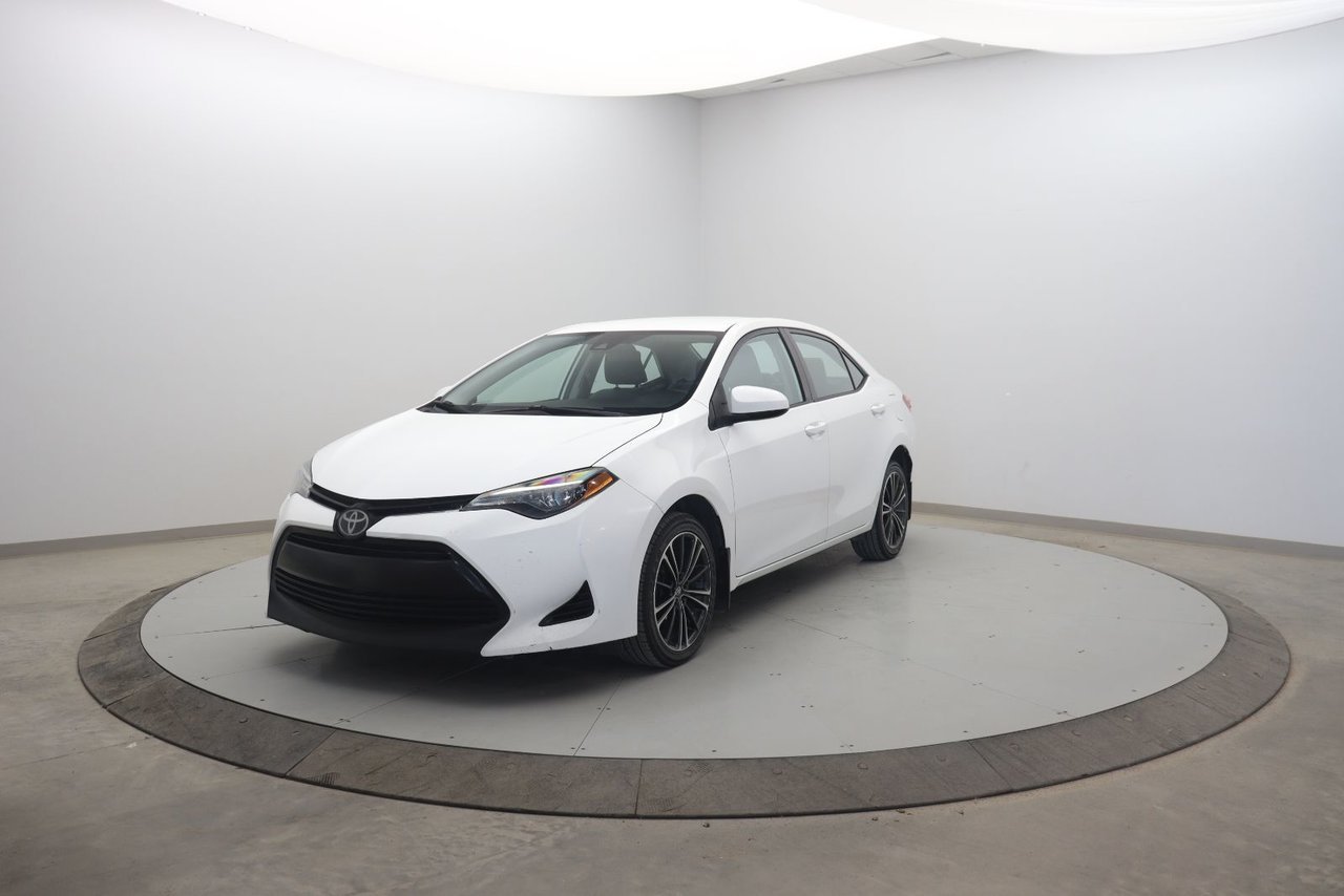 Toyota Corolla NIV 2T1BURHE5JC086477 2018 Blanc Baie-Comeau - photo #0