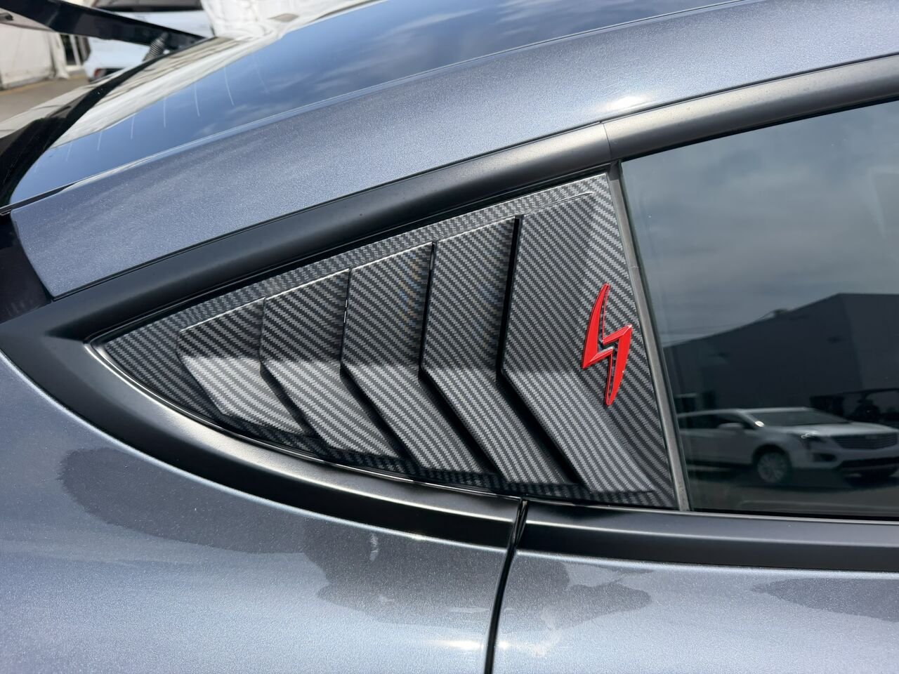 Tesla Model 3 CARBONE 2023 Argent Laval - photo #14