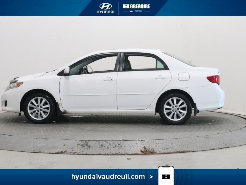 2009 Toyota Corolla White Laval - photo #5
