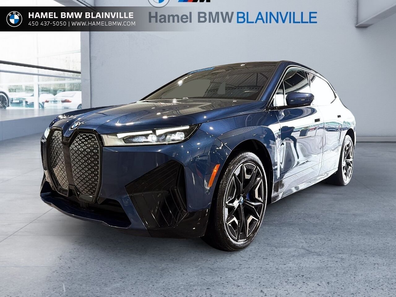 BMW iX xDrive40 véhicule d'activités sportives 2024 Bleu Blainville - photo #0
