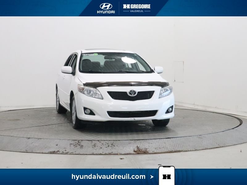 2009 Toyota Corolla White Laval - photo #0