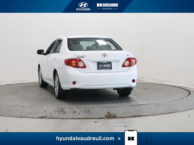 2009 Toyota Corolla White Laval - photo #10