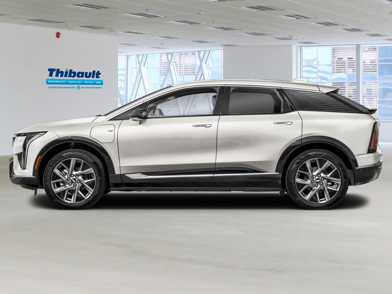 CADILLAC OPTIQ Sport haut de gamme 4 portes 2027 Blanc Sherbrooke - photo #1