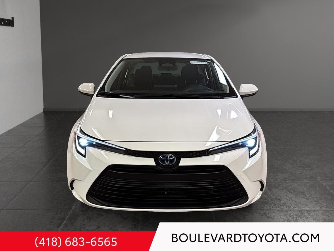 Toyota Corolla 531689-75 | LE HYBRIDE, AWD 2025 Blanc Québec - photo #1