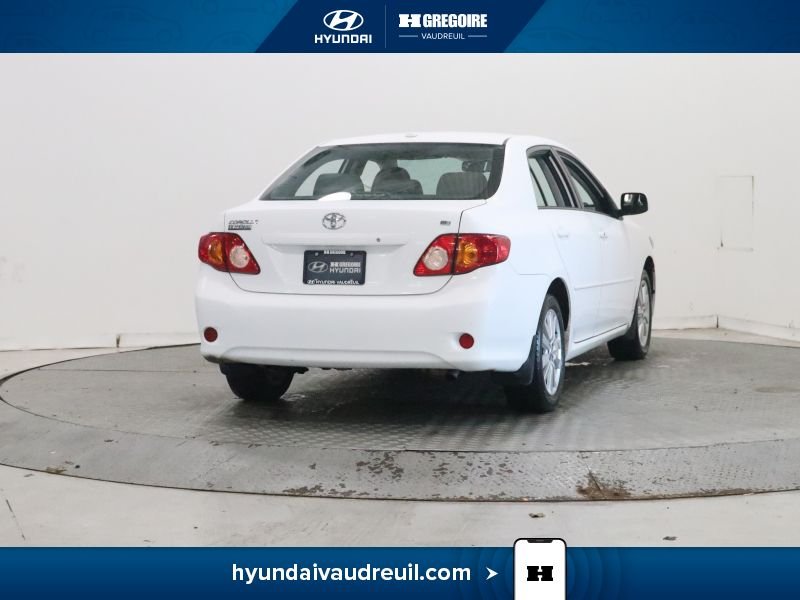 2009 Toyota Corolla White Laval - photo #7